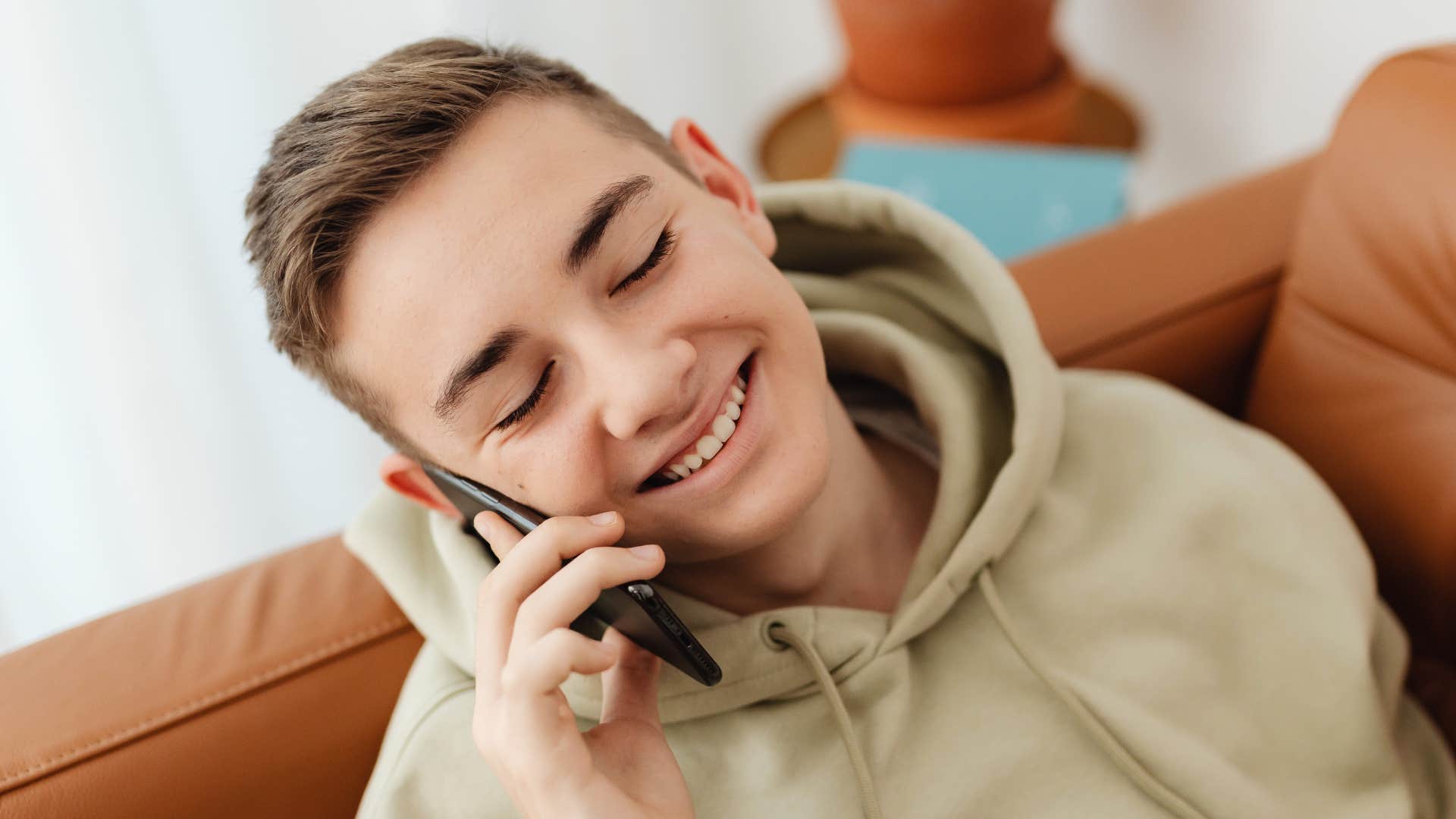 teen talking on the phone