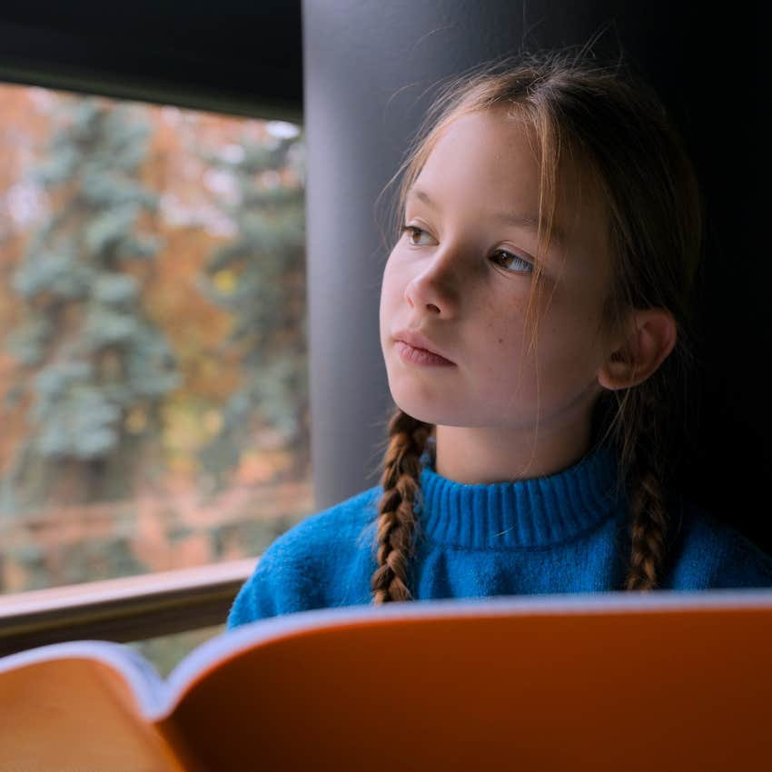 Little girl in a small town who appreciates simplicity.