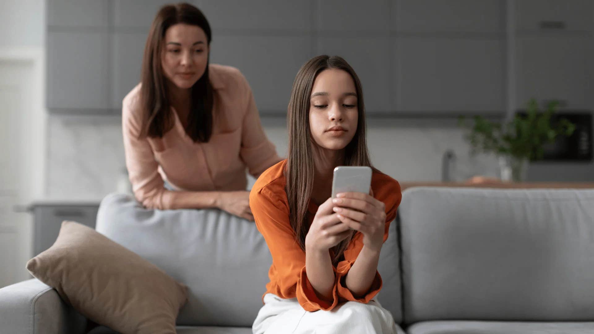teenager ignoring woman telling her i can't trust you to make your own decisions