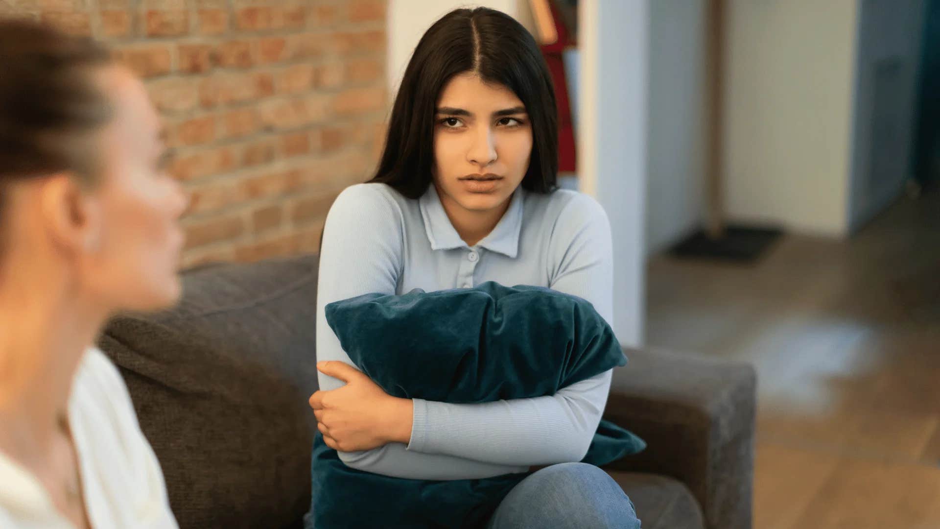 young woman being told you're just like so and so