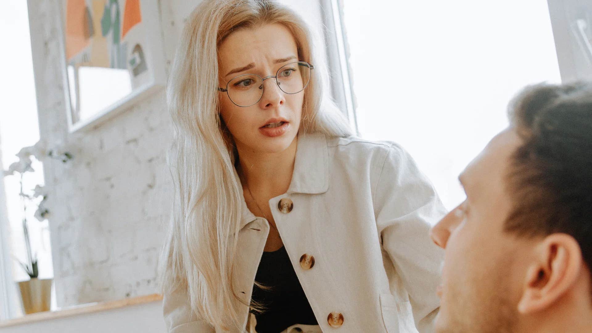 upset woman being asked why are you so sensitive
