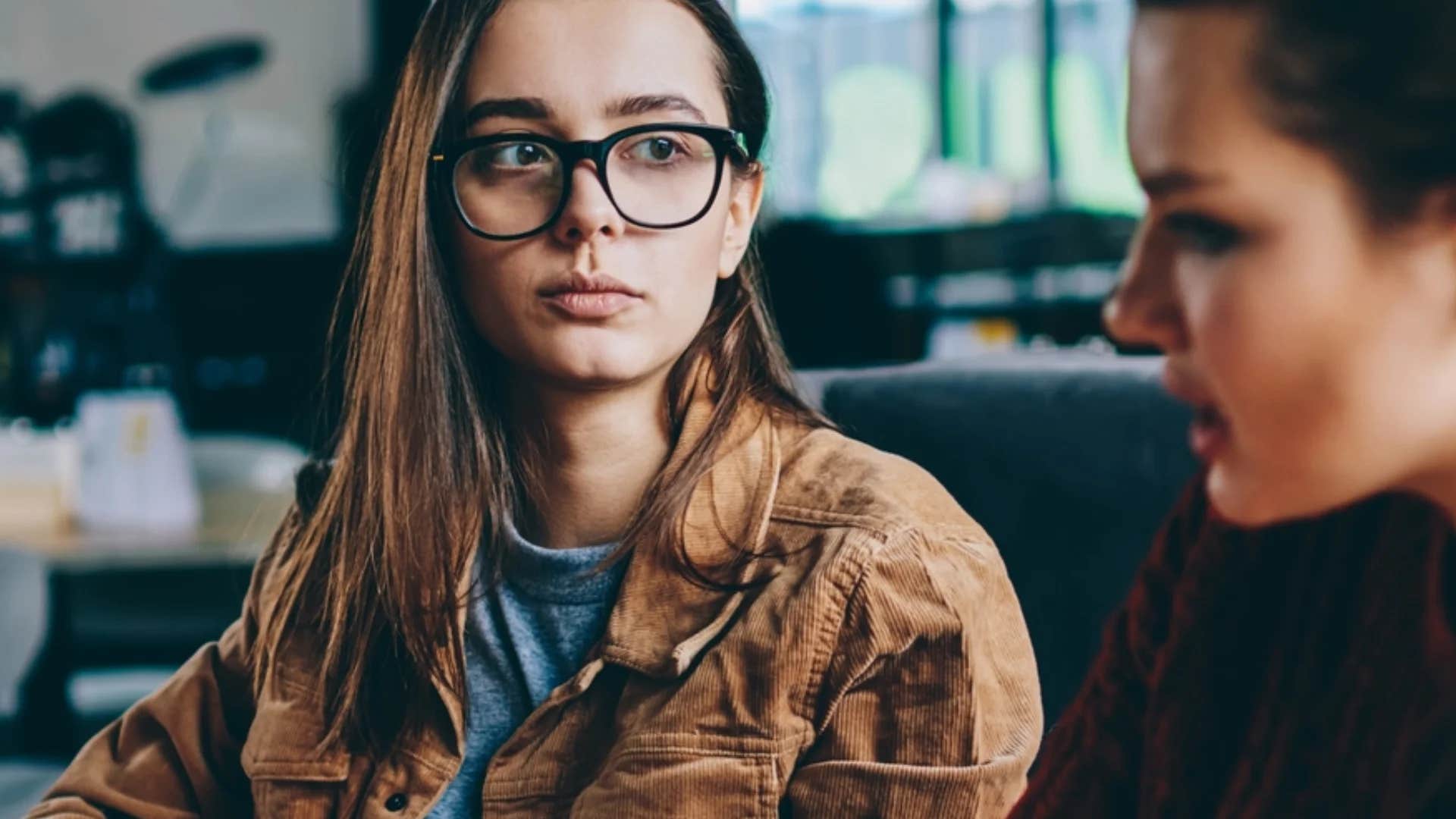 woman telling friend i just don't want anyone to be mad at me