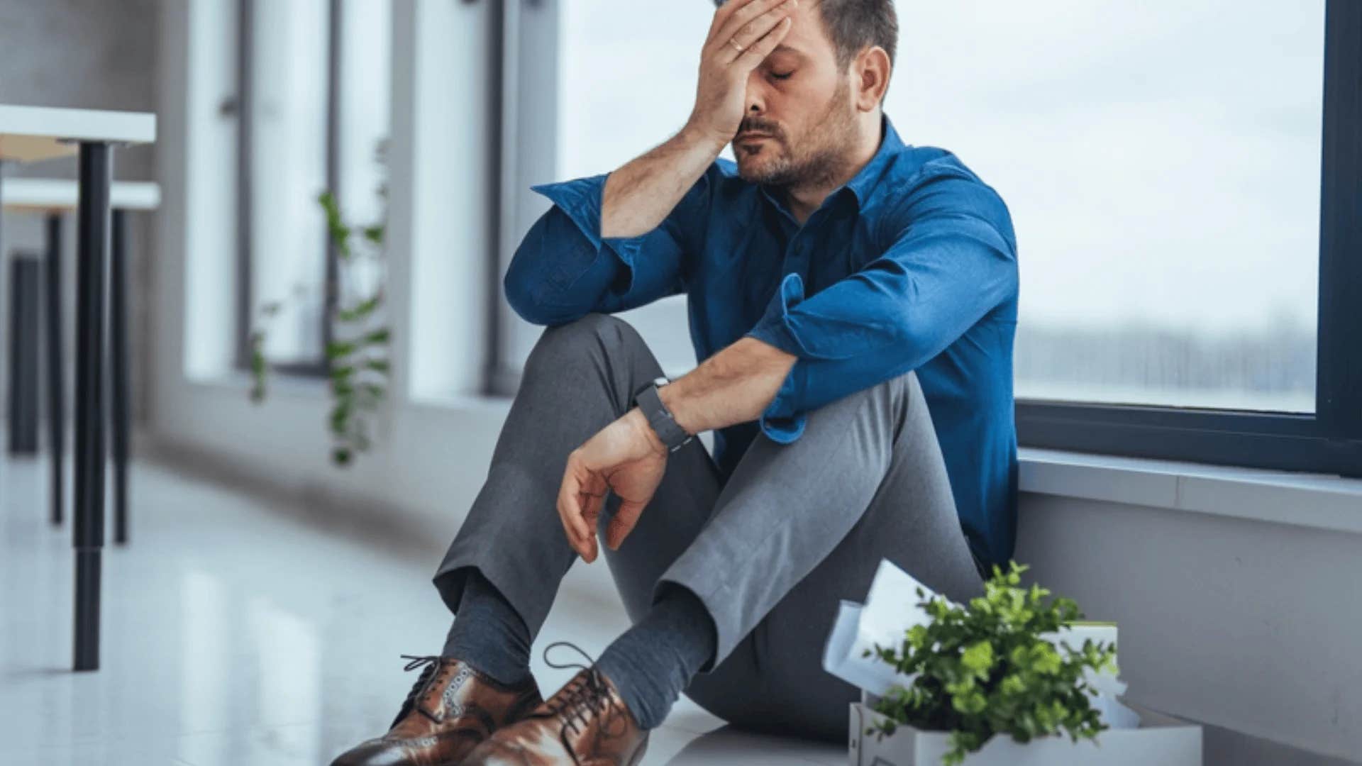 upset man saying i'm hanging in there