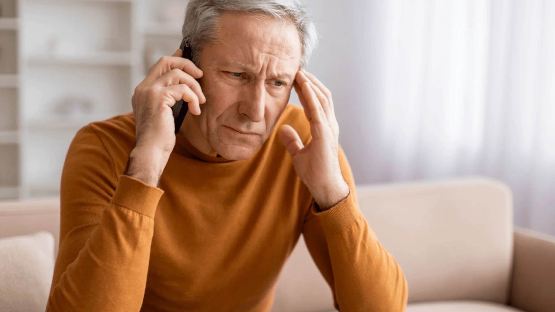 older man on phone saying i'm just having a bad day
