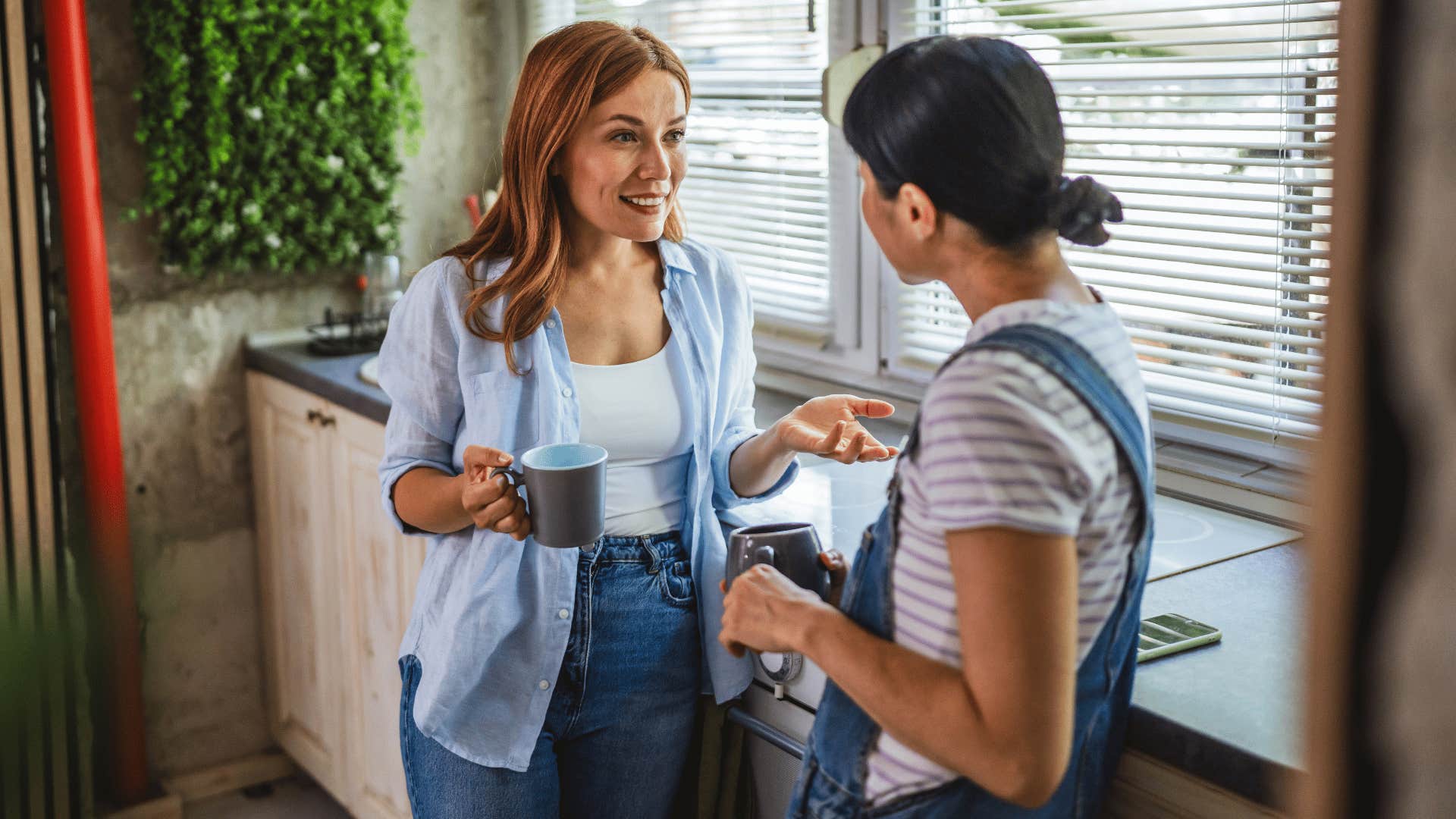 woman with blonde hair telling friend over coffee i'm waiting until payday