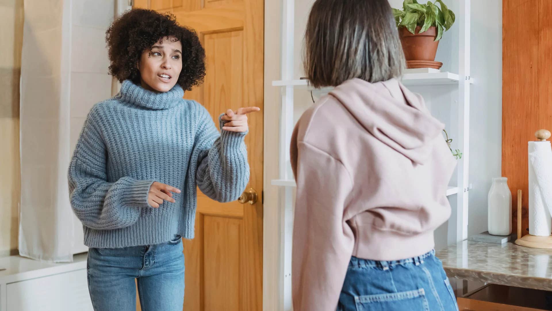 woman with low emotional maturity telling friend that's nothing you should hear what happened to me