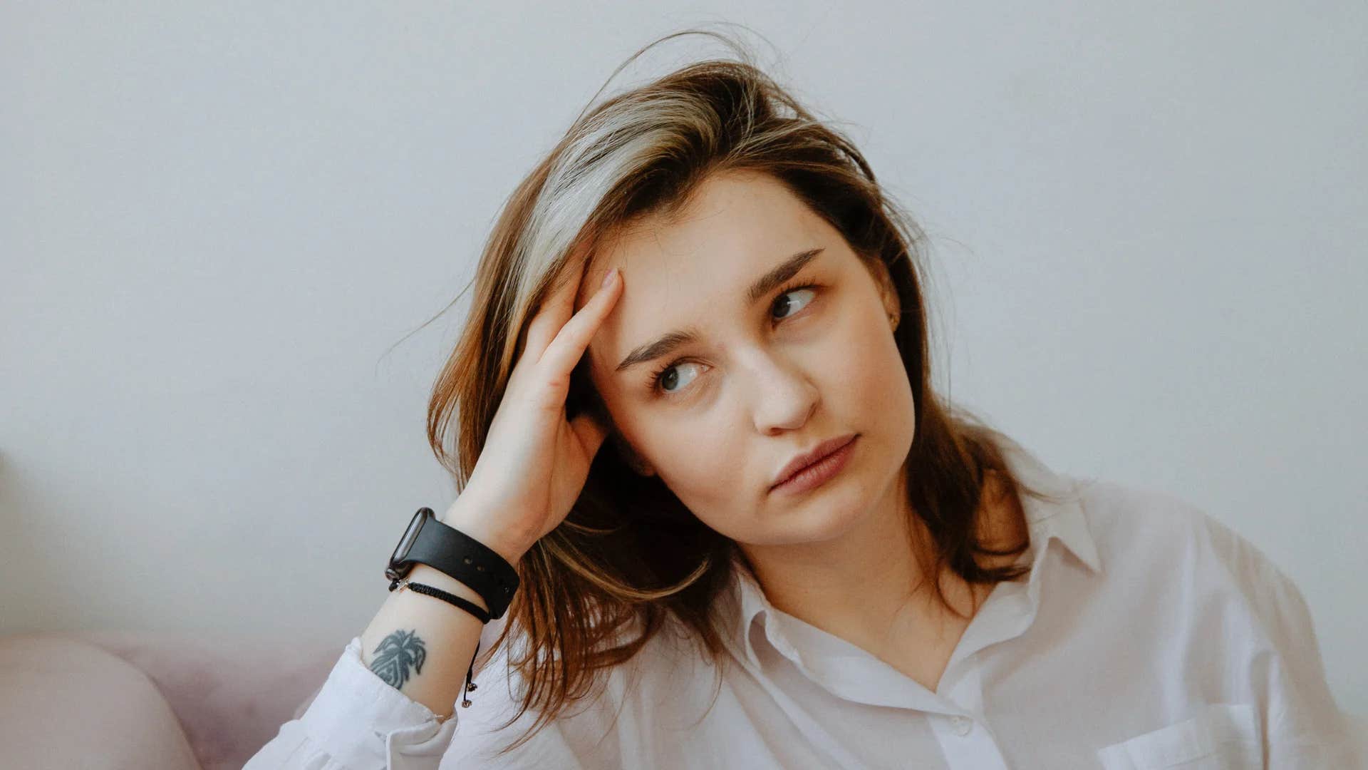 young woman with low emotional maturity saying whatever