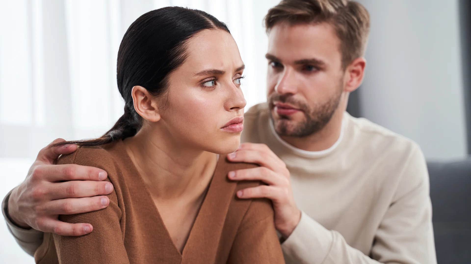 man asking woman if something happened
