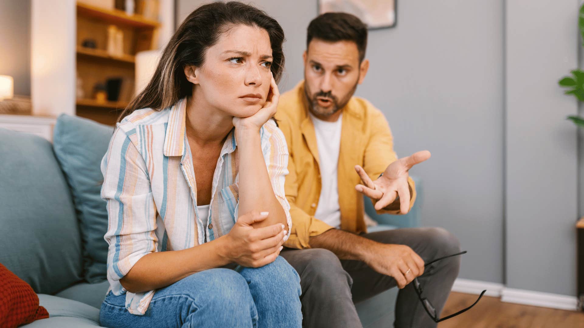 woman upset as she tells man in yellow jacket nothing sounds fun anymore