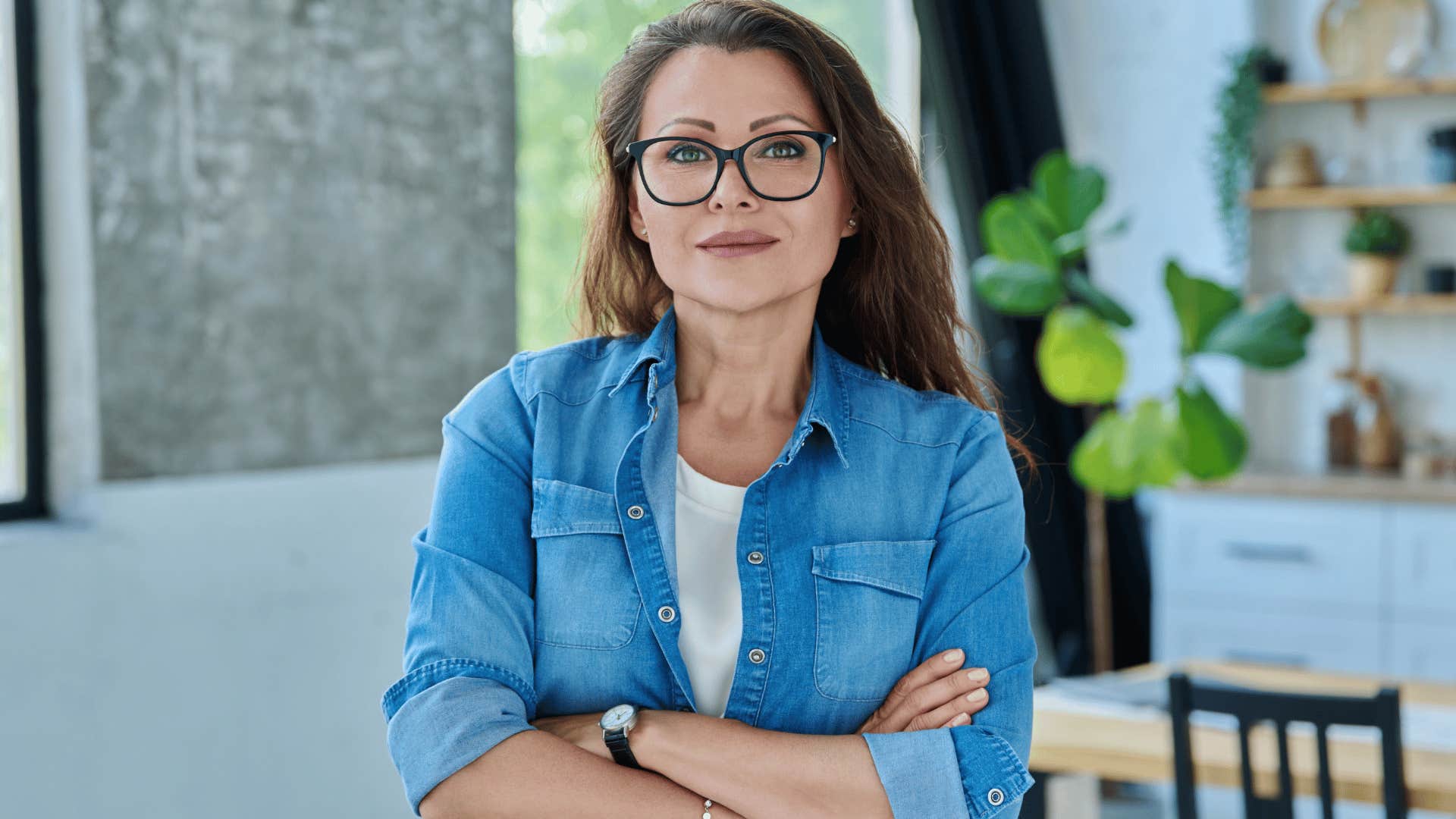woman in jean jacket crossing arms as she says i'll figure it out on my own