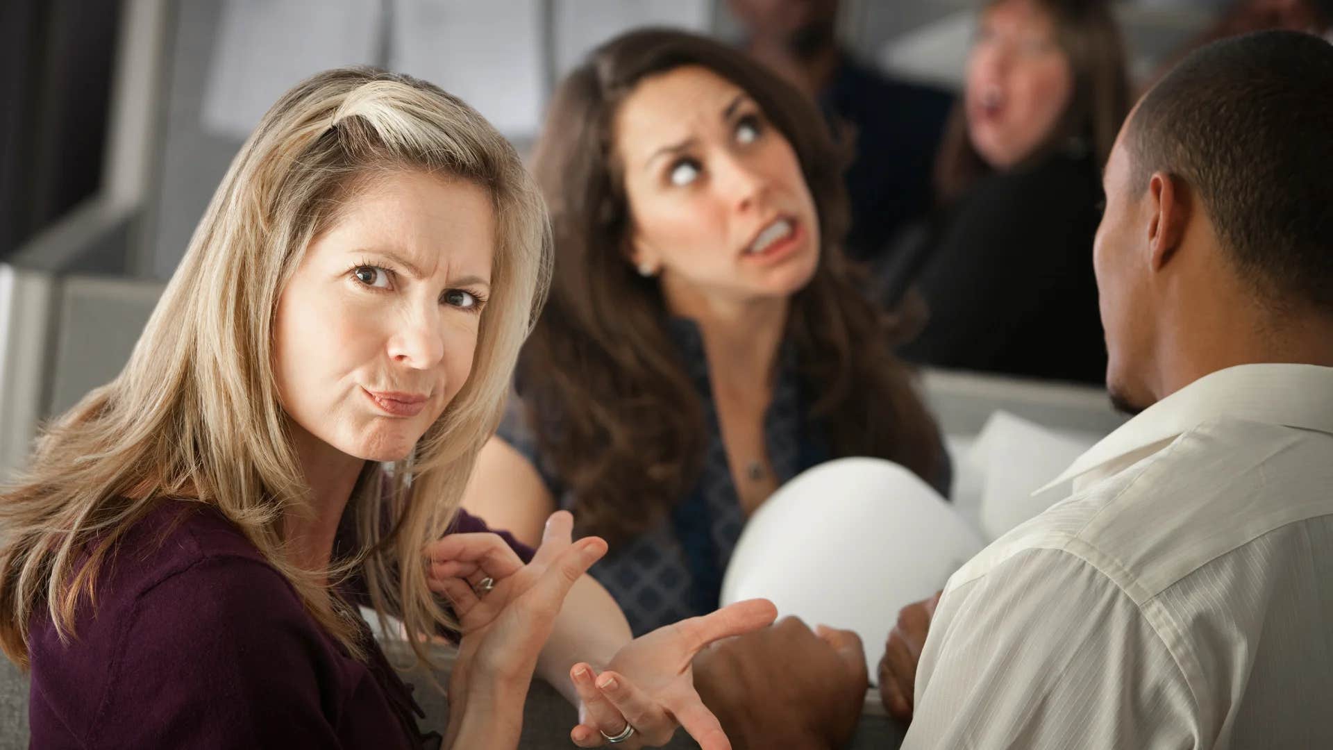 woman responding to friend saying la la la