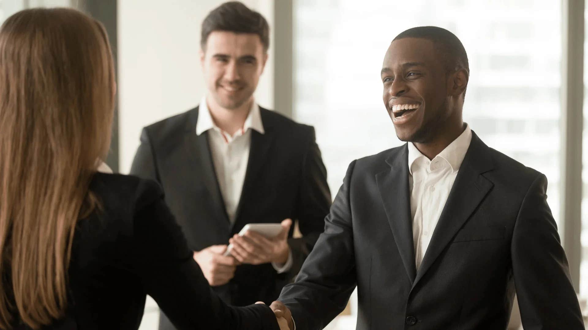 man telling colleague we're all on the same page