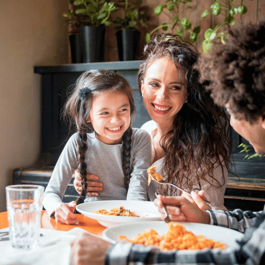 parent and child eating off of the same plate