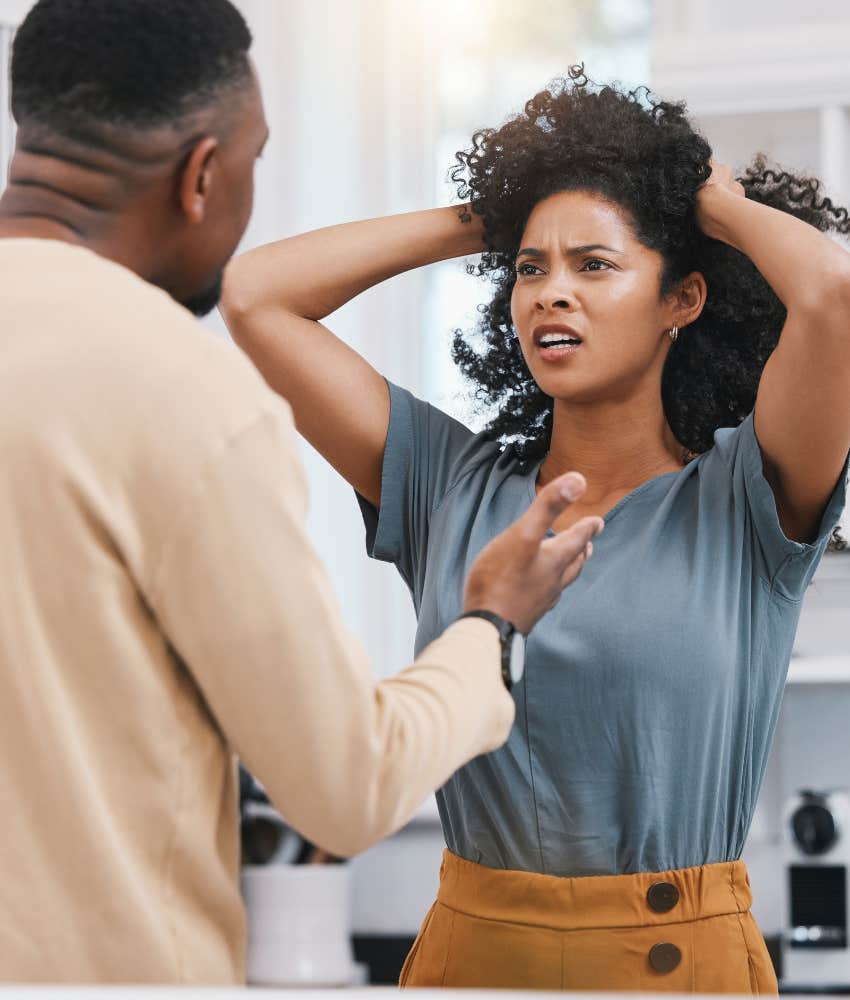 woman frustrated talking to her male partner about back rent