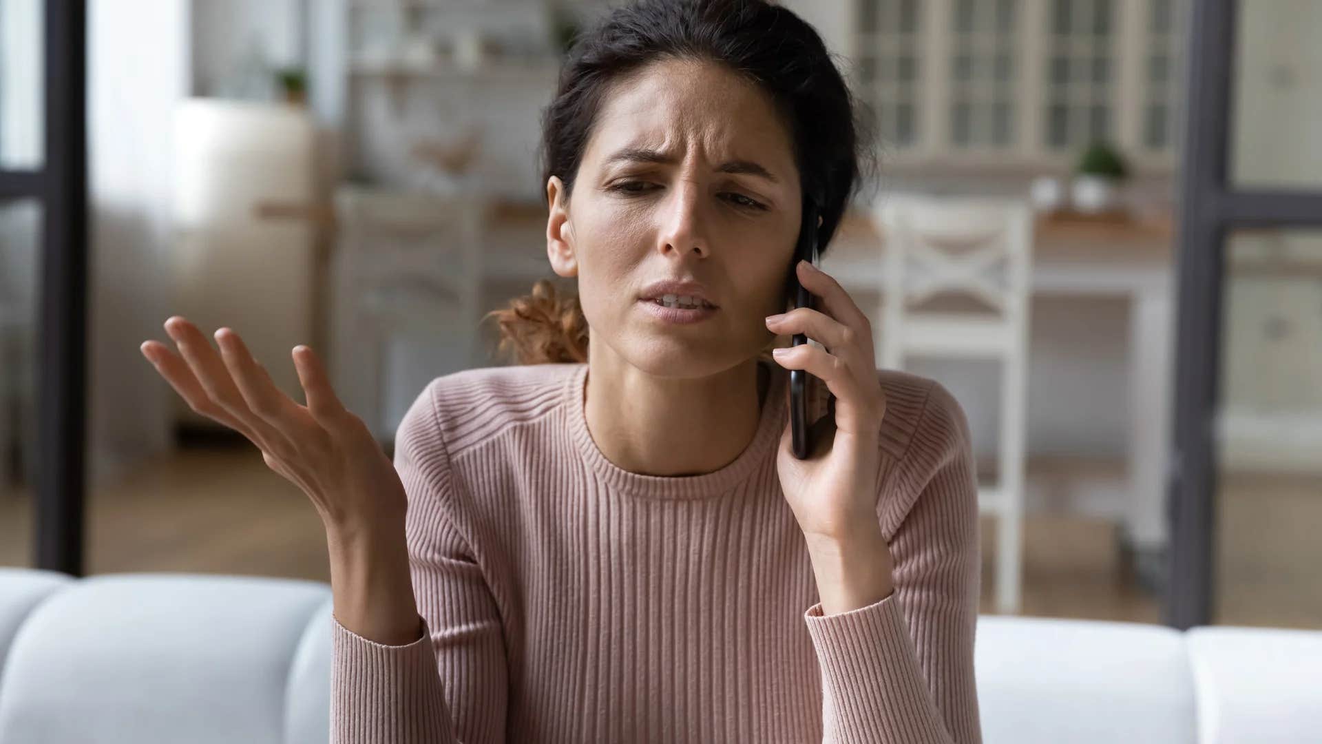 woman on phone saying i'm probably just overreacting