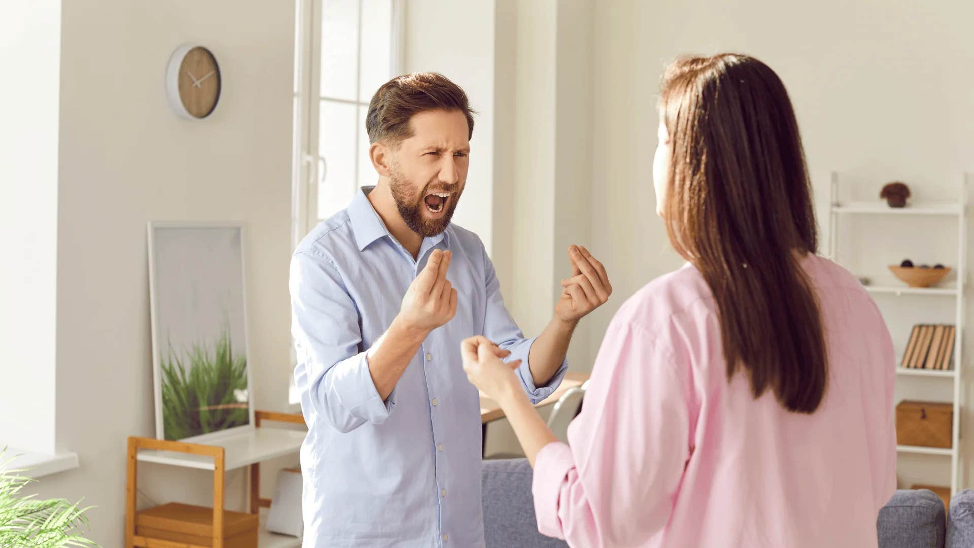 woman telling upset man just relax