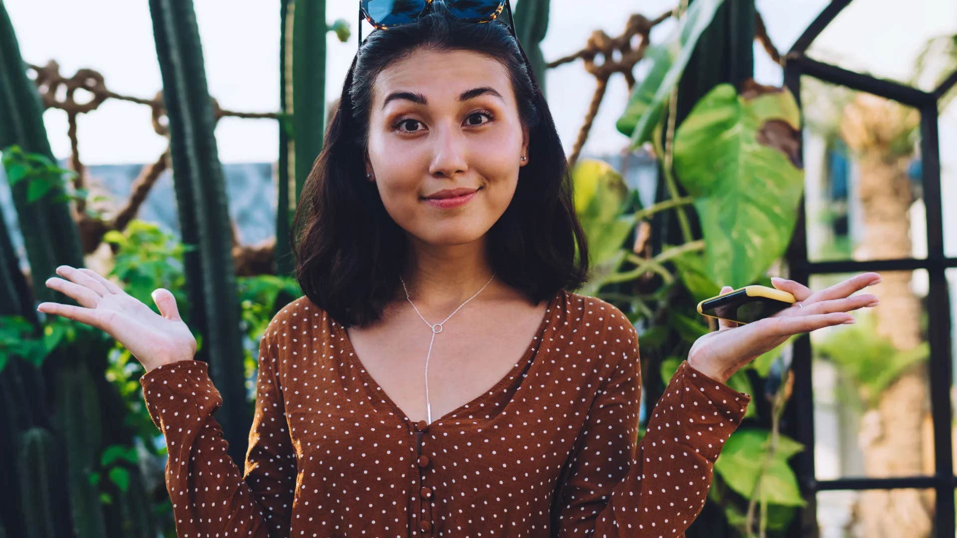 woman shrugging saying i guess i can't do anything right