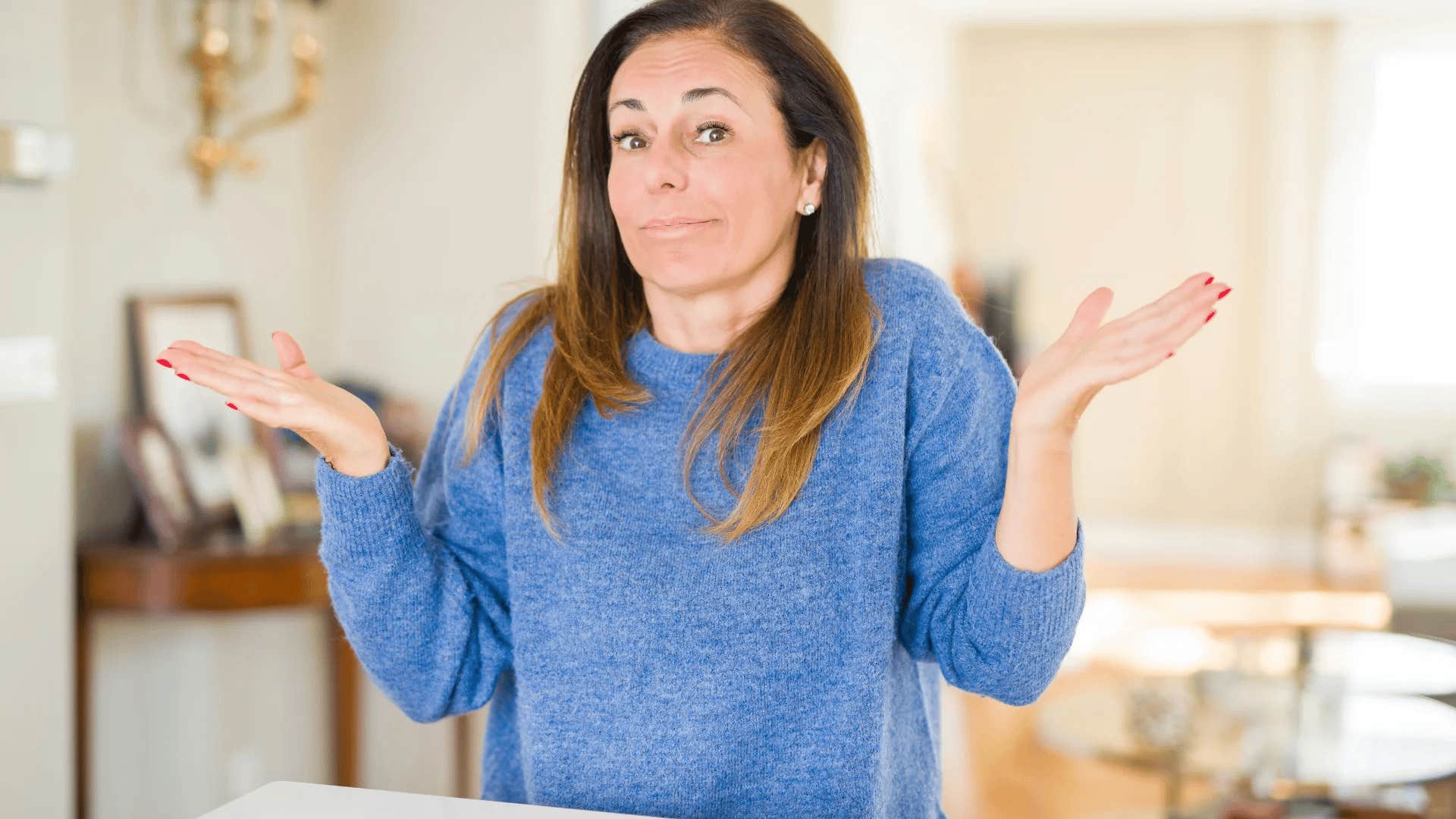 privileged woman shrugging saying that's never happened to me