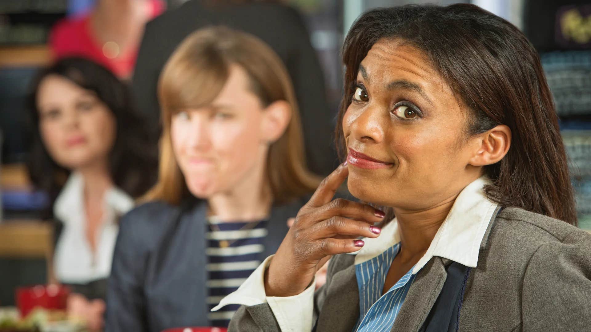 woman smiling condescendingly saying i wish i had time for things like that