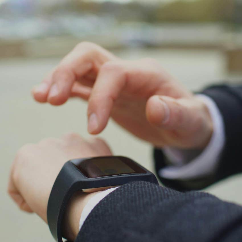 man who values his time checking his watch