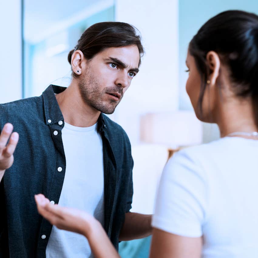 Man saying "do whatever you want" to his partner.