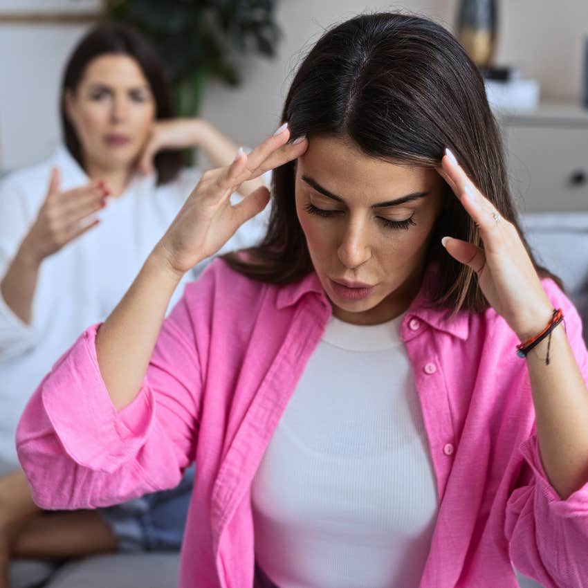 hypocritical woman faking being upset telling friend I never said that