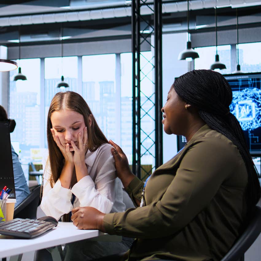 tired and stressed woman telling boss I woke up late