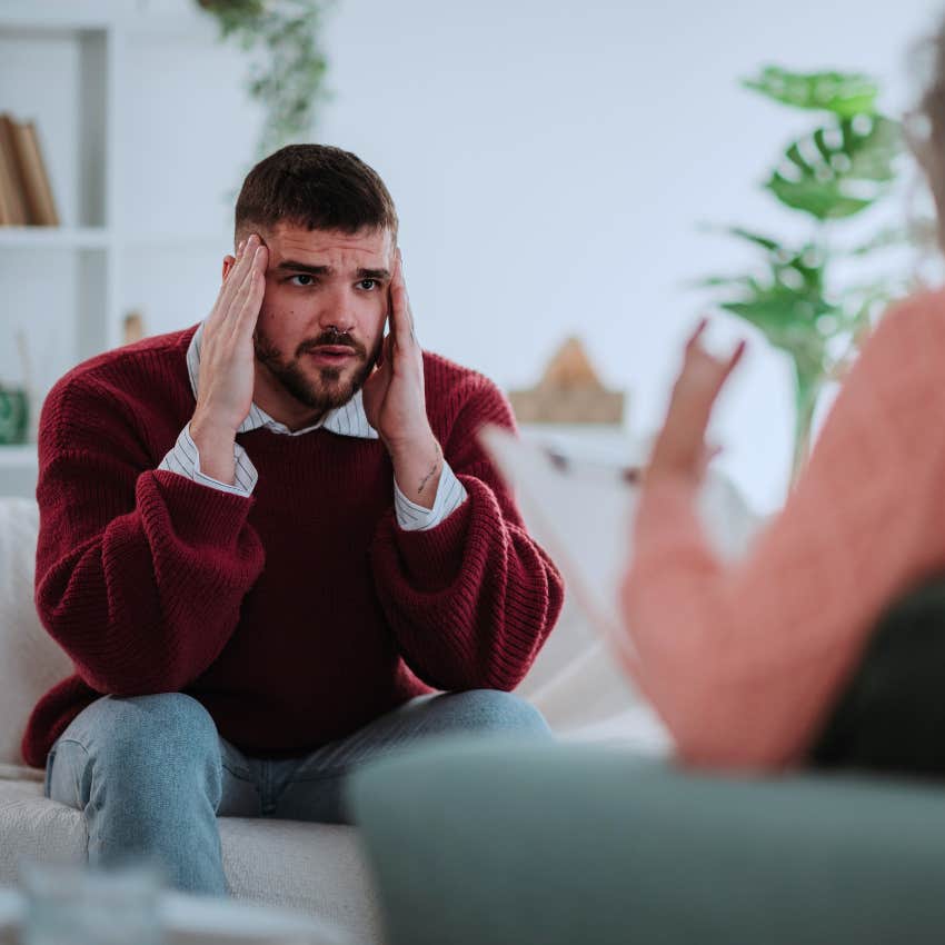 Man saying "I just have a lot on my plate" to his co-worker.