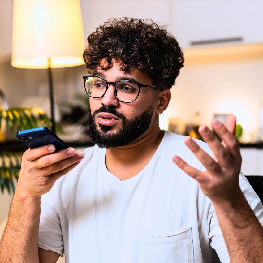 Man saying "I'm busy this weekend" on the phone.