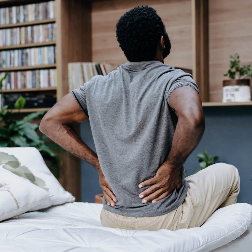 young person with back pain