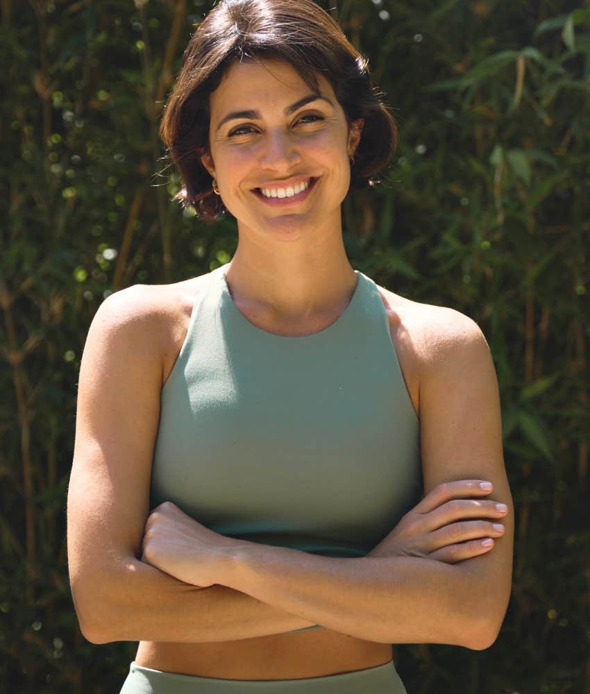 woman smiling during time alone because she said no 