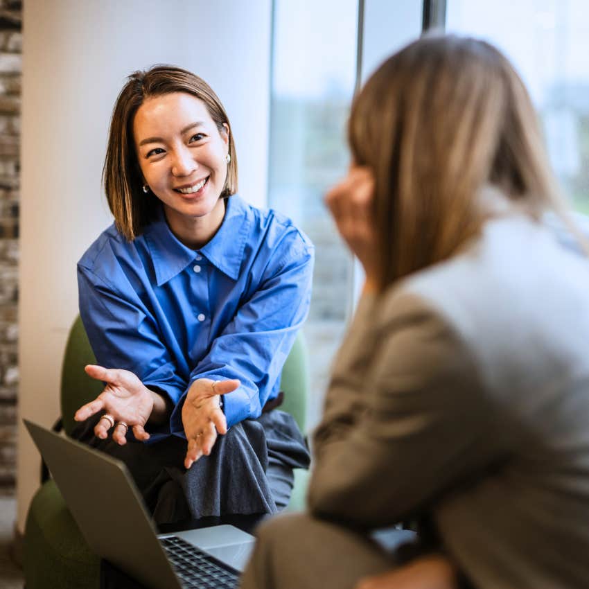 smart woman using clear language at work with colleague