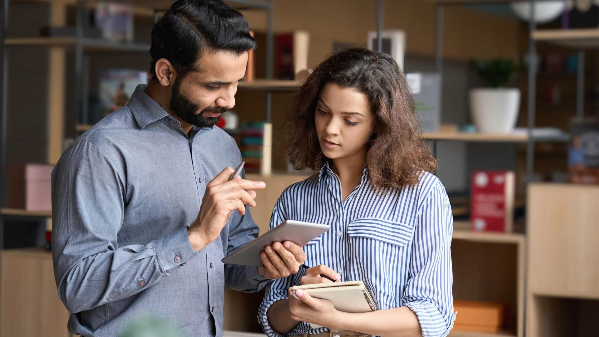 man telling woman your productivity lately isn't aligning with team expectations