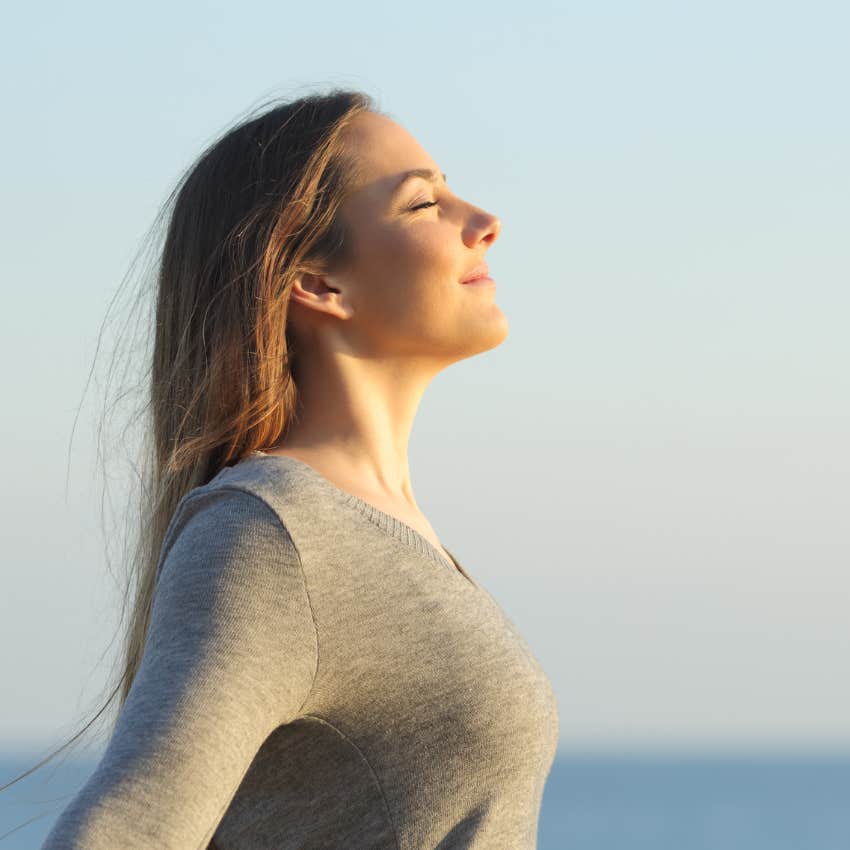 person with high distress tolerance taking a deep breath