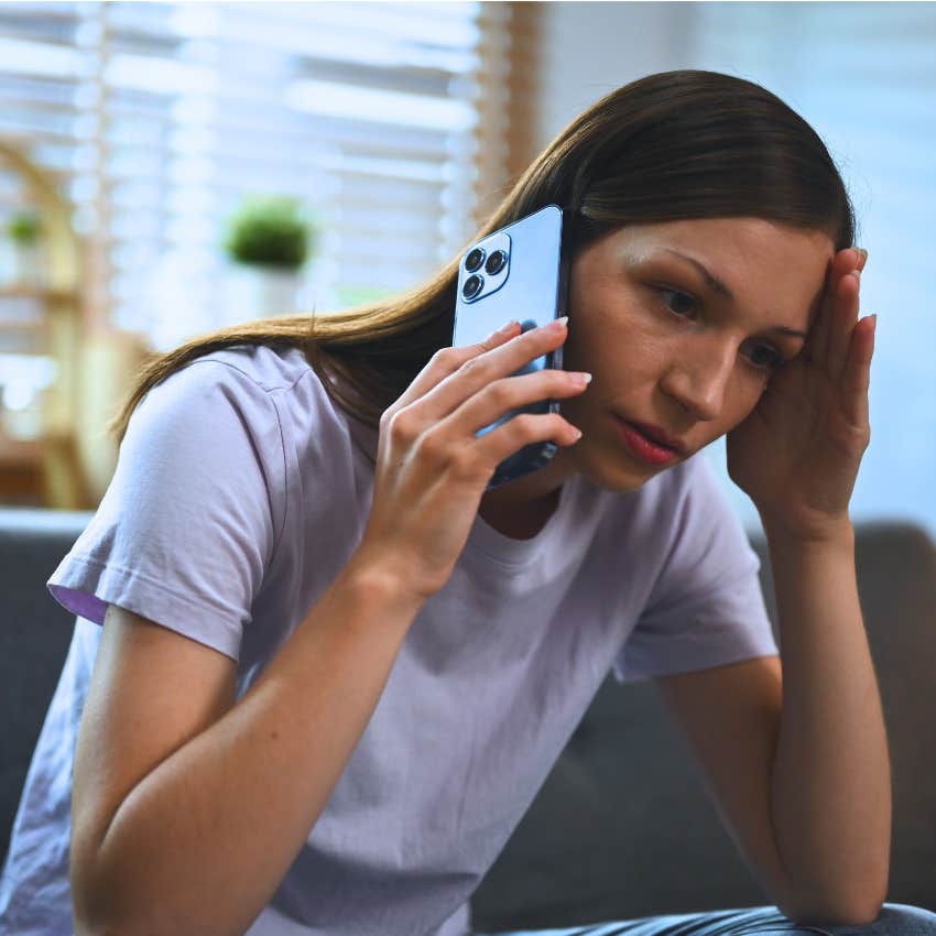 emotionally fragile woman on the phone embarrassed saying I can't believe I did that