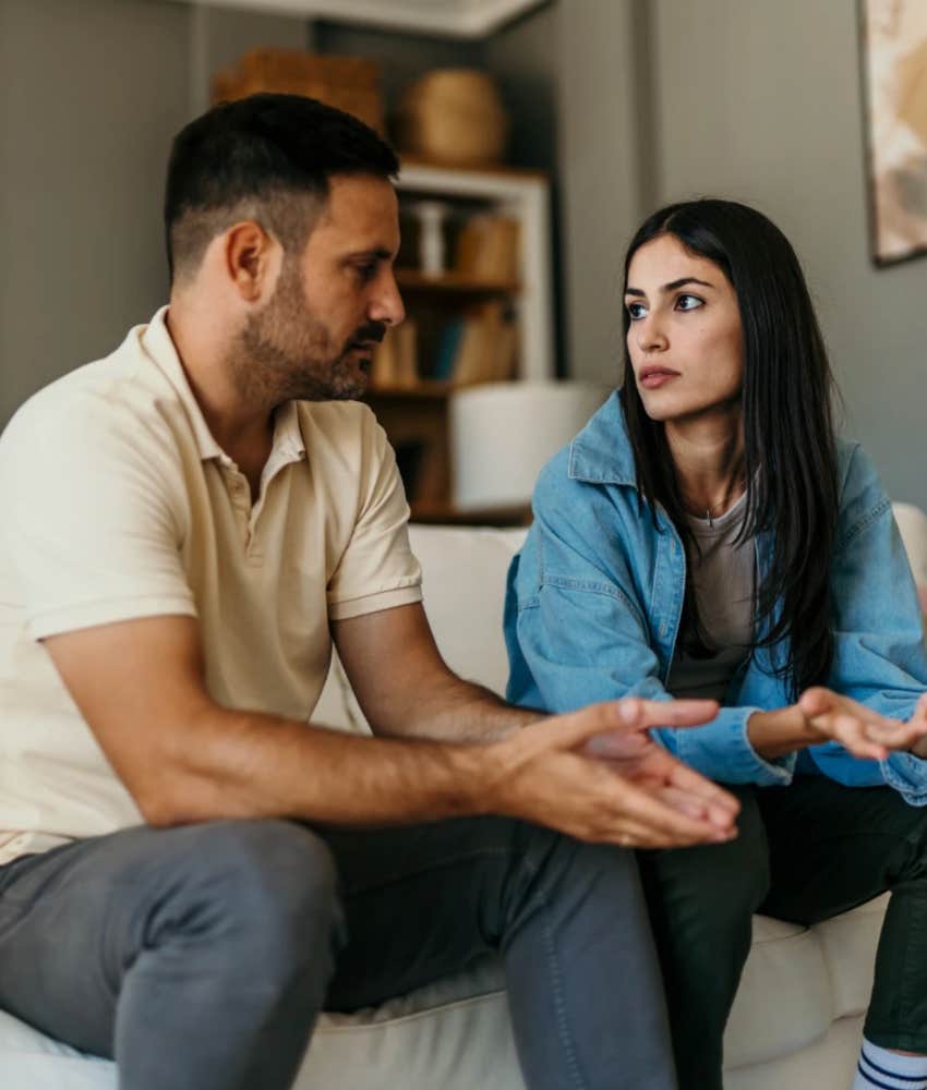 High vibe woman talking to a man about therapy on a couch 