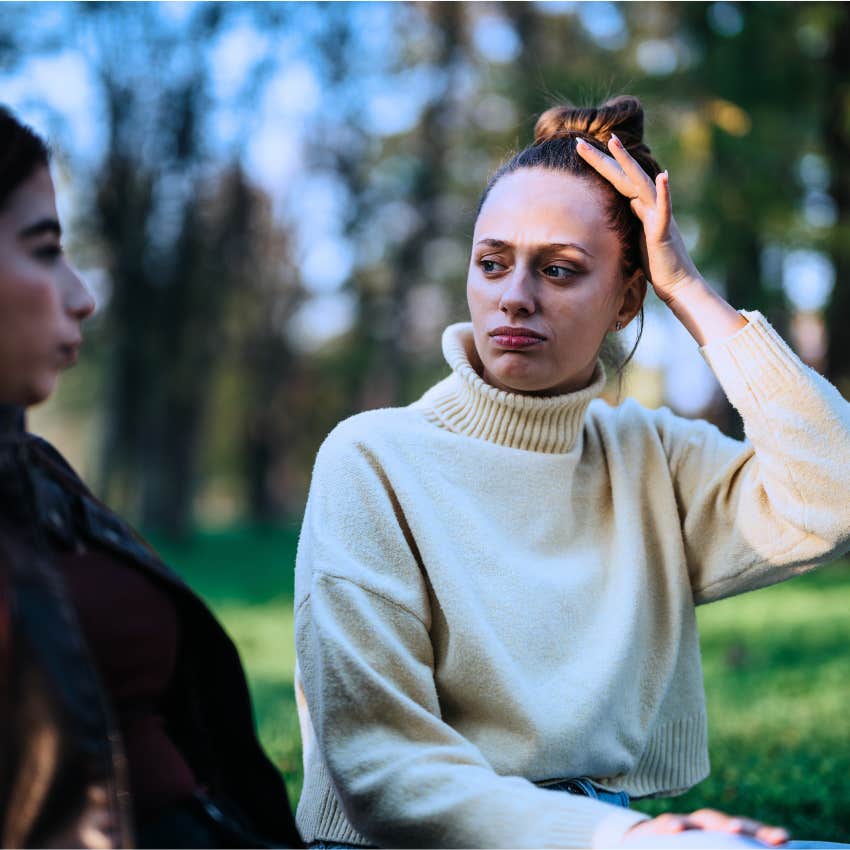 woman not worried about being disliked sitting with friend