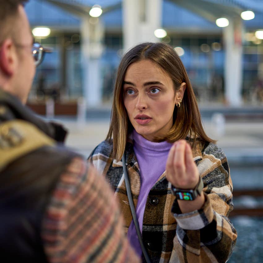 woman talking to a rude stranger in public