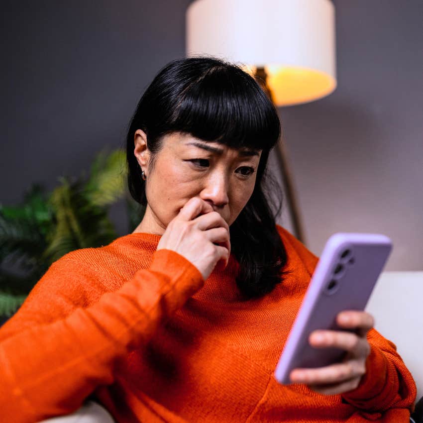 woman looking at social media competing and comparing herself