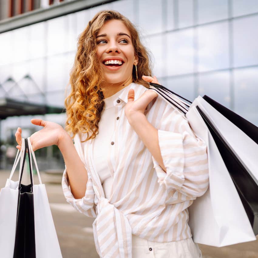 woman who expects her parents to bail her out financially enjoying a spending spree she feels she deserves