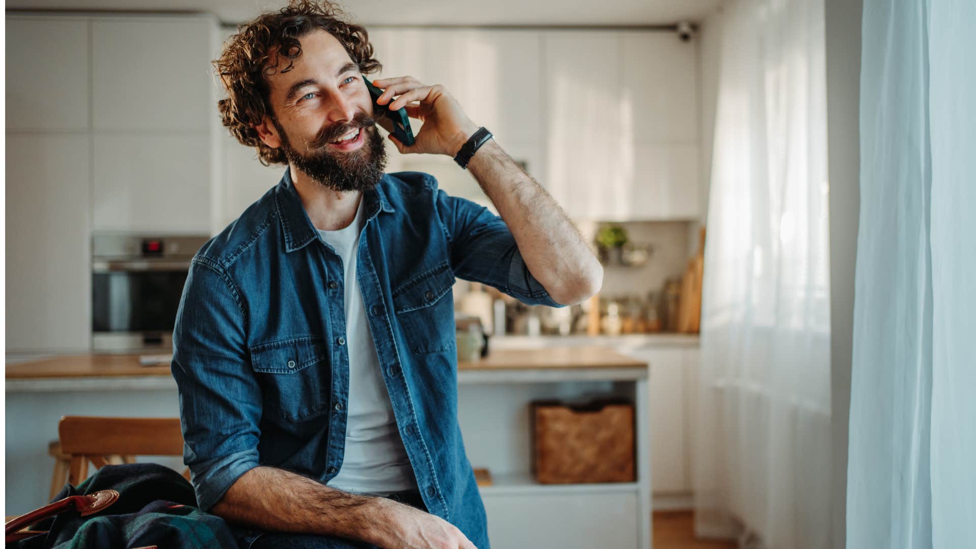 happily married husband on phone with friend needs to check with wife before confirming
