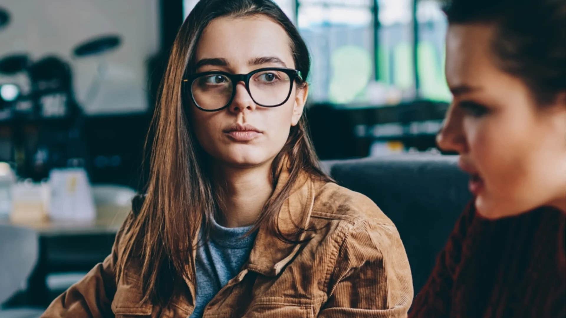 woman telling friend i was hoping to be wrong about that