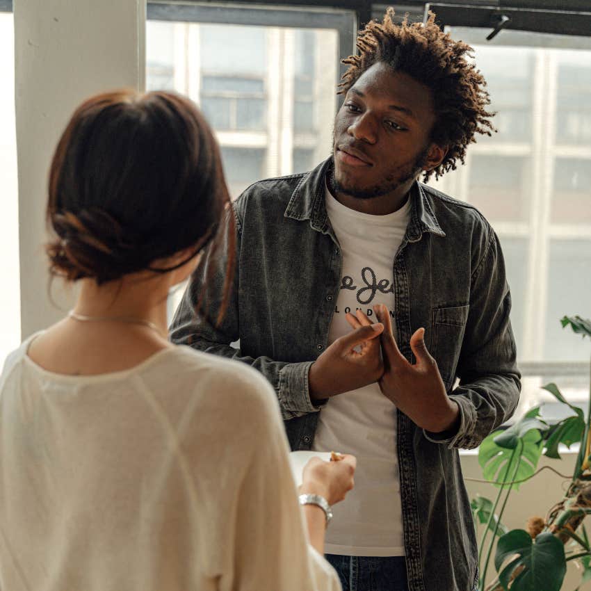 nervous man telling his colleague i've never done that before