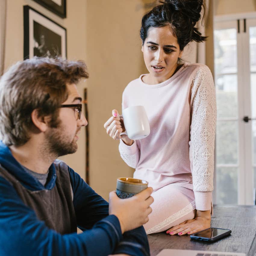 woman annoyed at having to do chores talking to her partner
