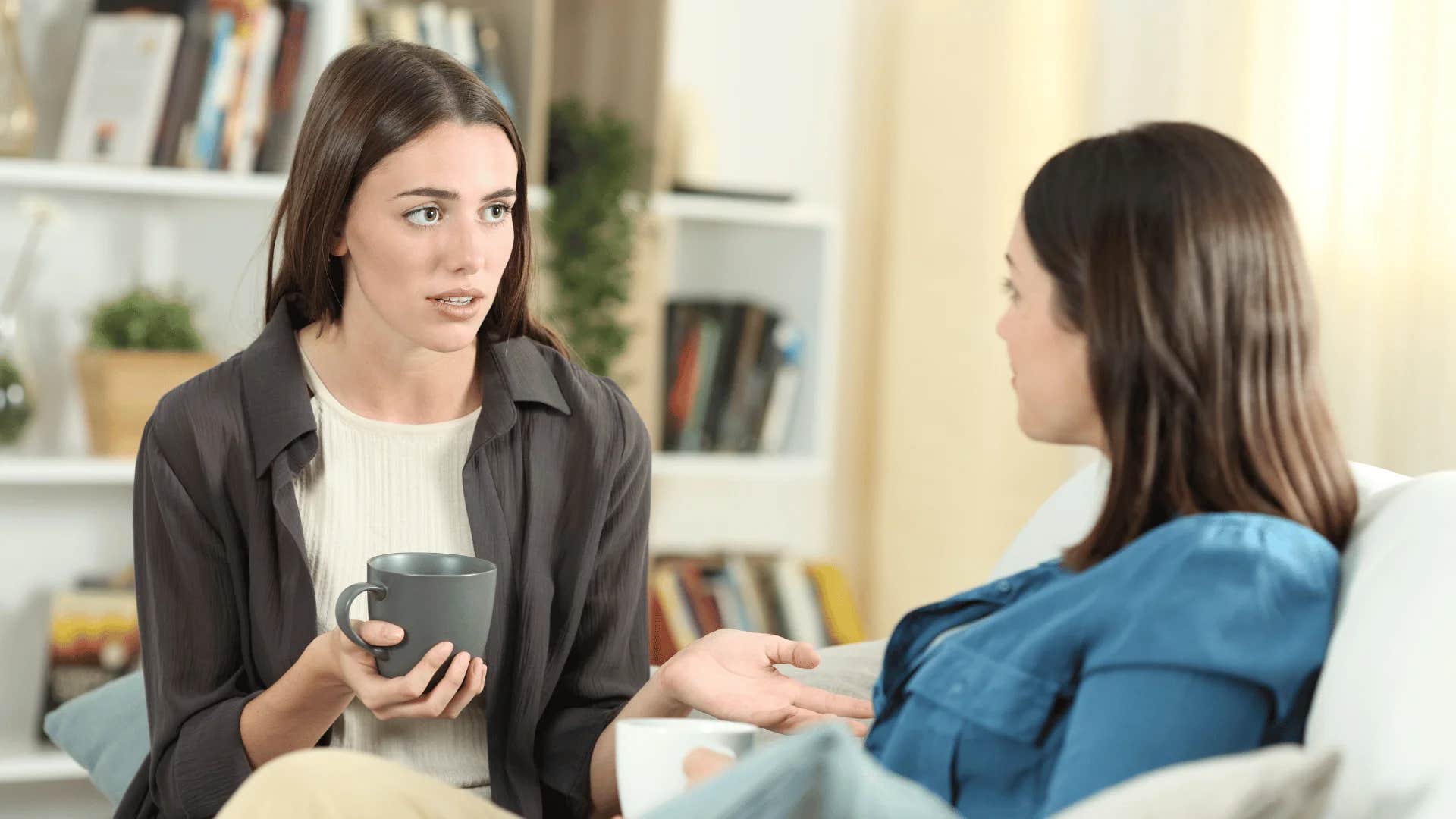 woman who hates small talk having coffee with friend politely ending conversation