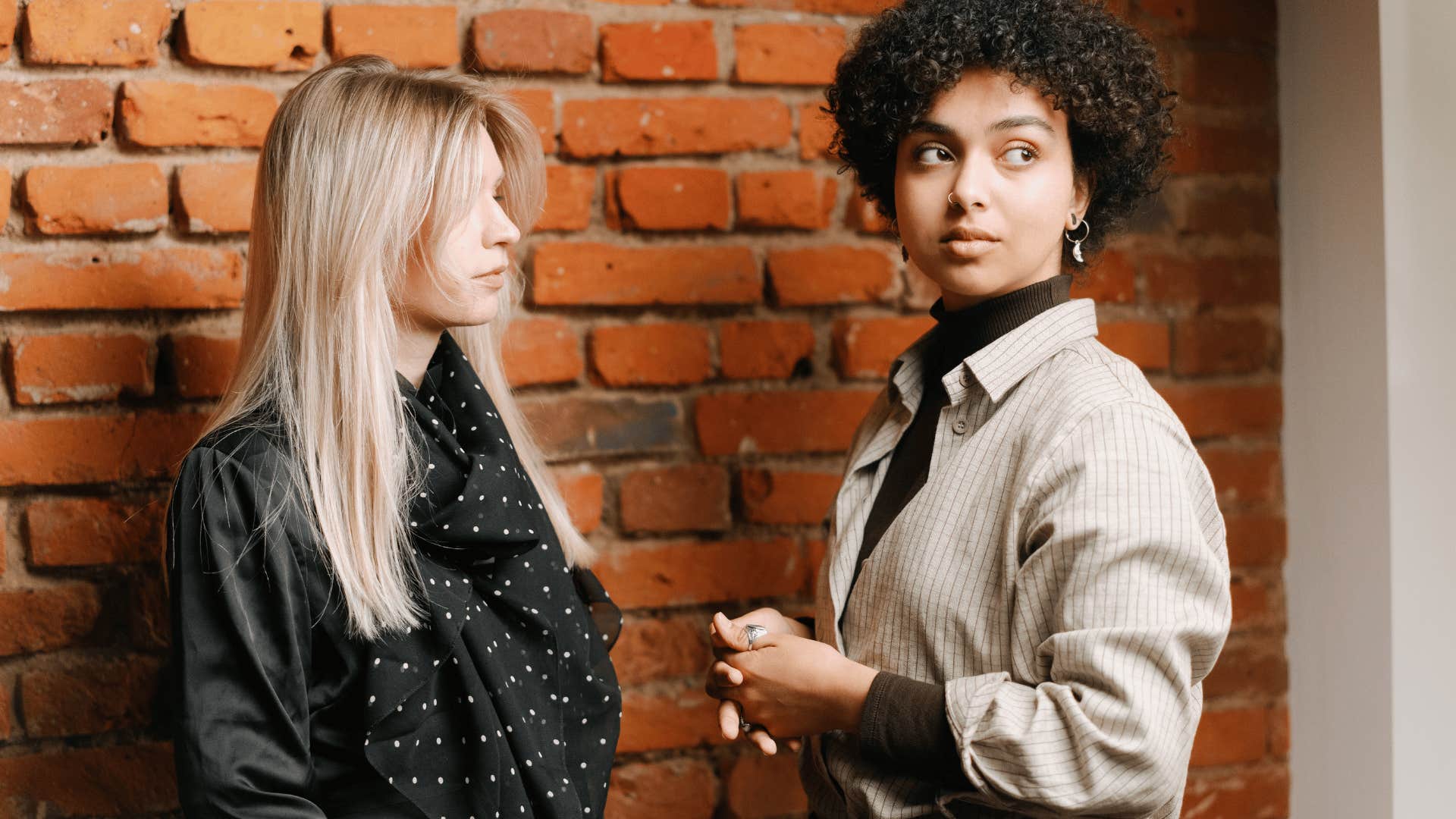 woman with low mental energy talking to friend saying there's a lot going on at work