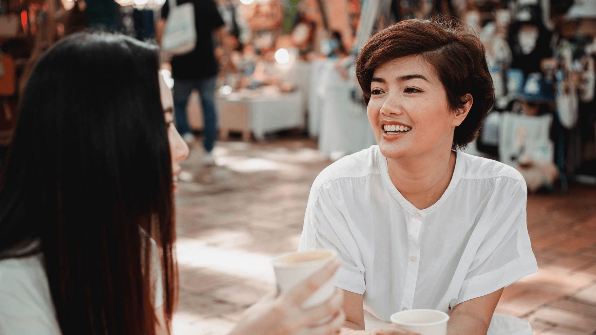 unforgettable woman talking to new friend asking her what she enjoys