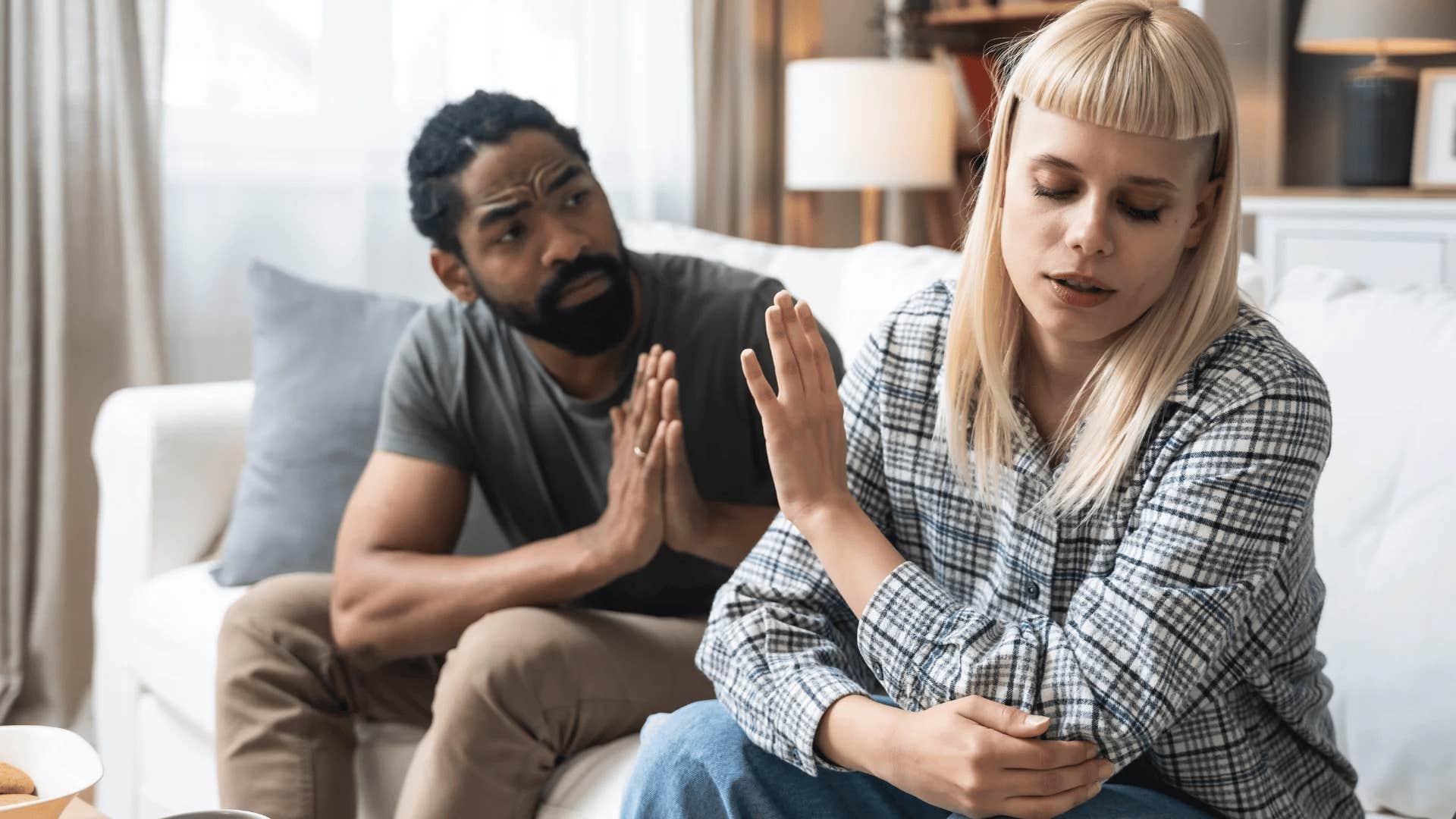 woman ignoring arrogant partner telling her you need to do this