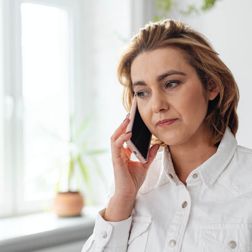 independent woman on the phone telling her friends to go without her