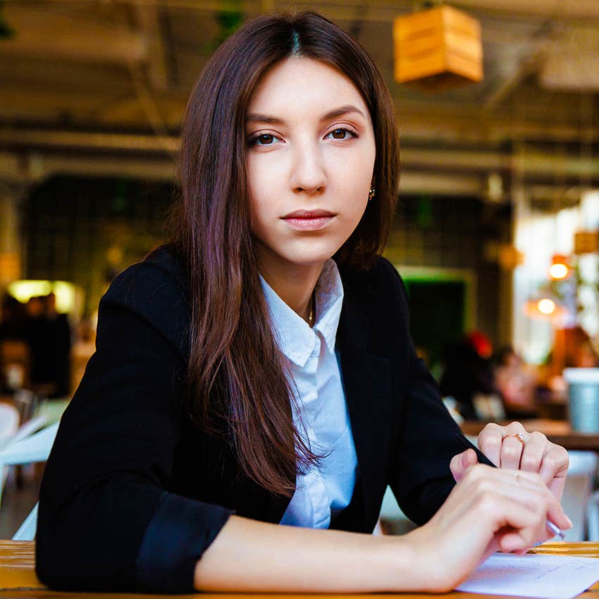 woman with strong intuition's heart starts pounding around someone she doesn't trust